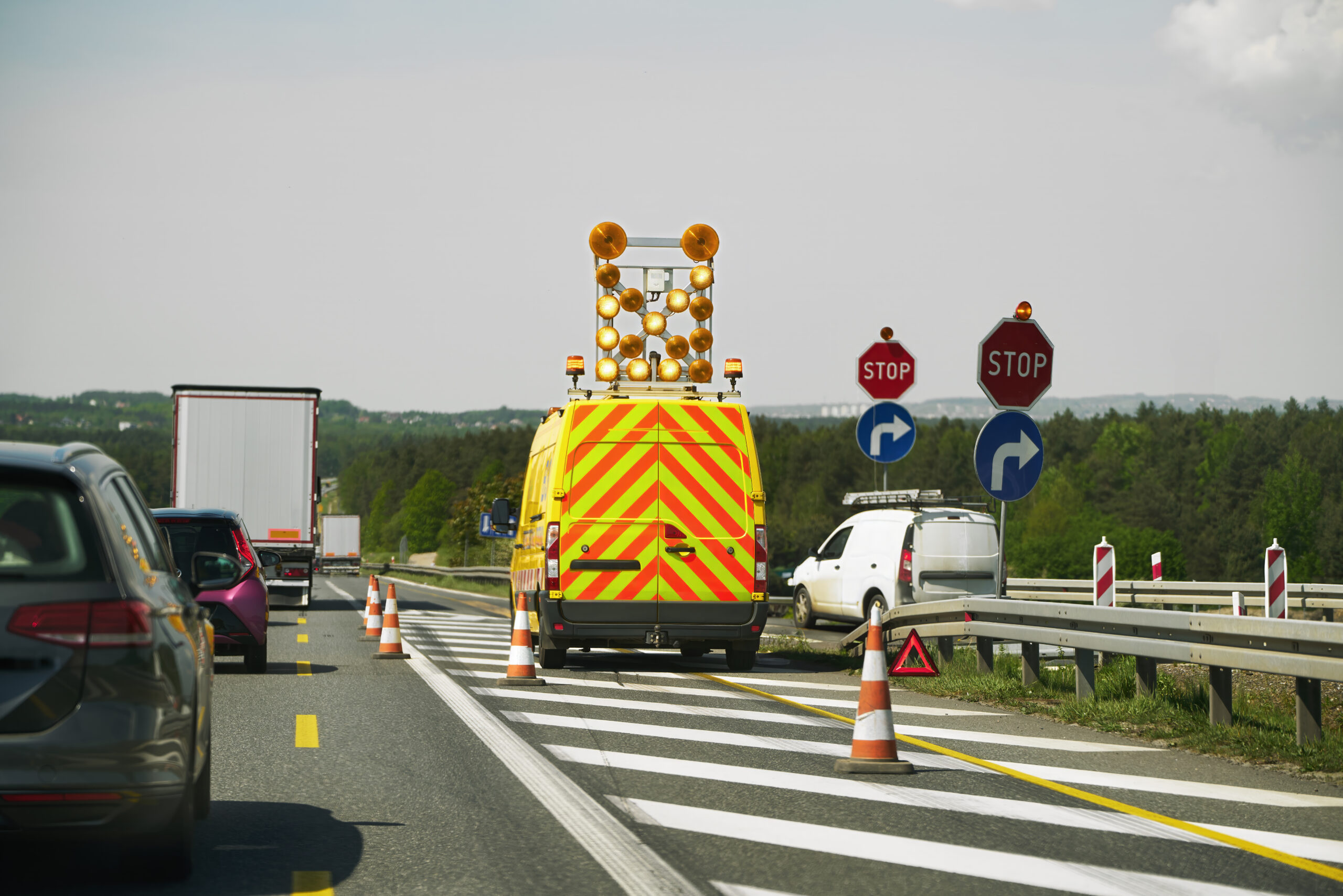 Traffic Control Vehicle With Warning Lights On Highway